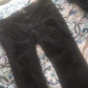black ripped jeans
